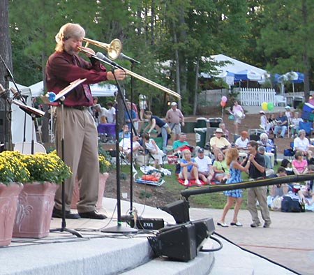Neal Finn, trombone, and dancers